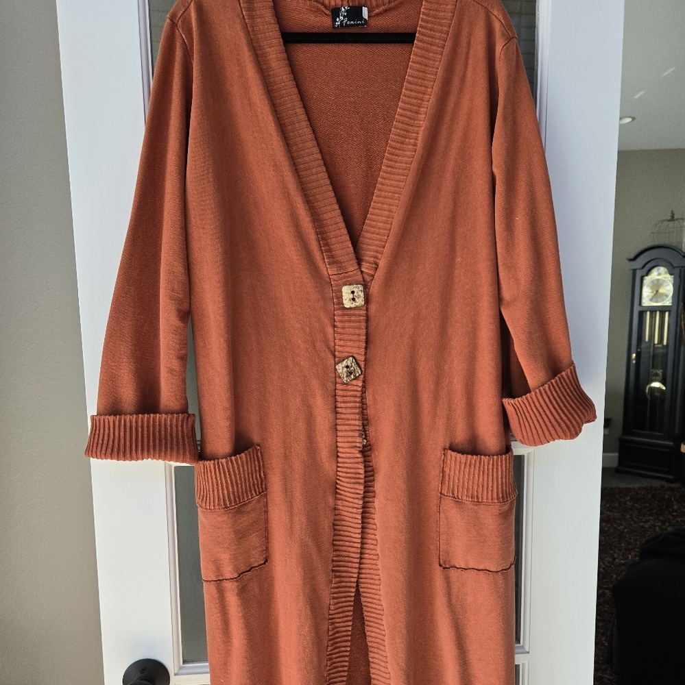 Cozy Rust long sweatshirt material with Button Details. Great for layering.